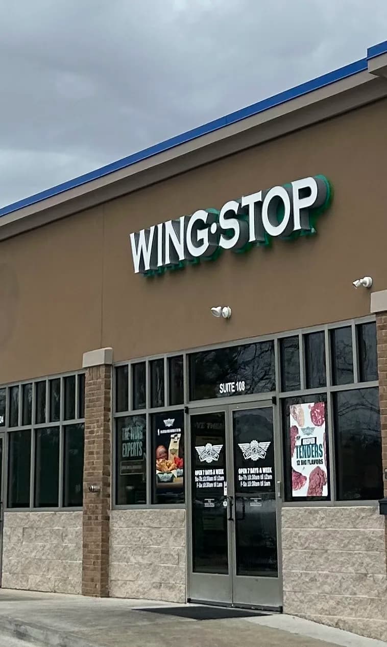 Wingstop storefront outside and inside view at 1680 East-West Connector Ste 108 in Austell, Georgia