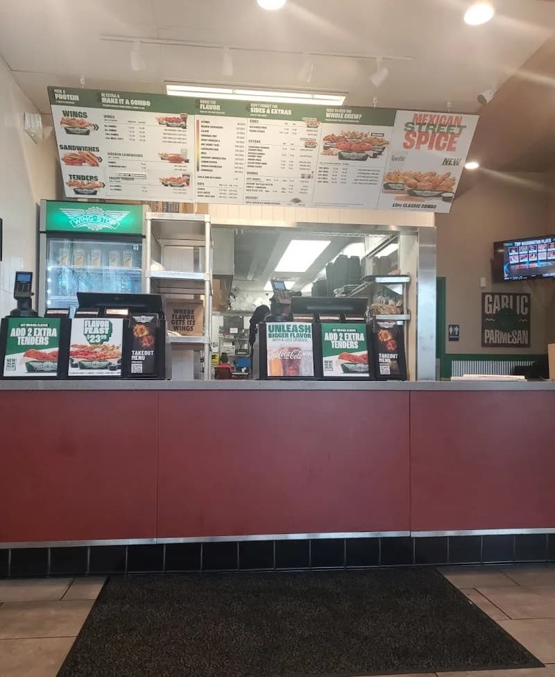 Wingstop storefront outside and inside view at 789 SR 96 in Bonaire, Georgia