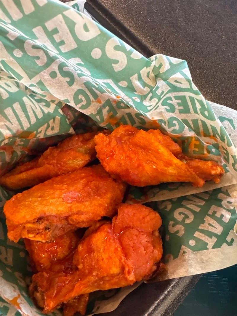 Wingstop storefront outside and inside view at 6361 Talokas Lane Ste. D-210B in Columbus, Georgia