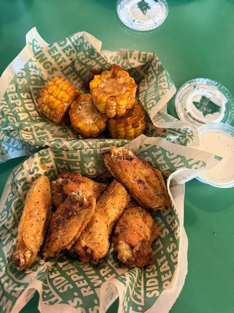 Wingstop storefront outside and inside view at 100 W. Walnut Ave in Dalton, Georgia