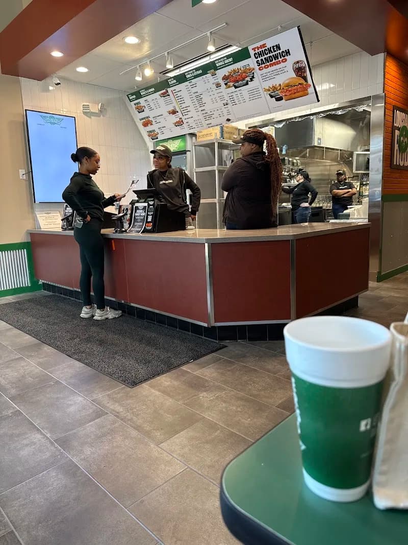 Wingstop storefront outside and inside view at 2502 Blackmon Dr Ste 830 in Decatur, Georgia