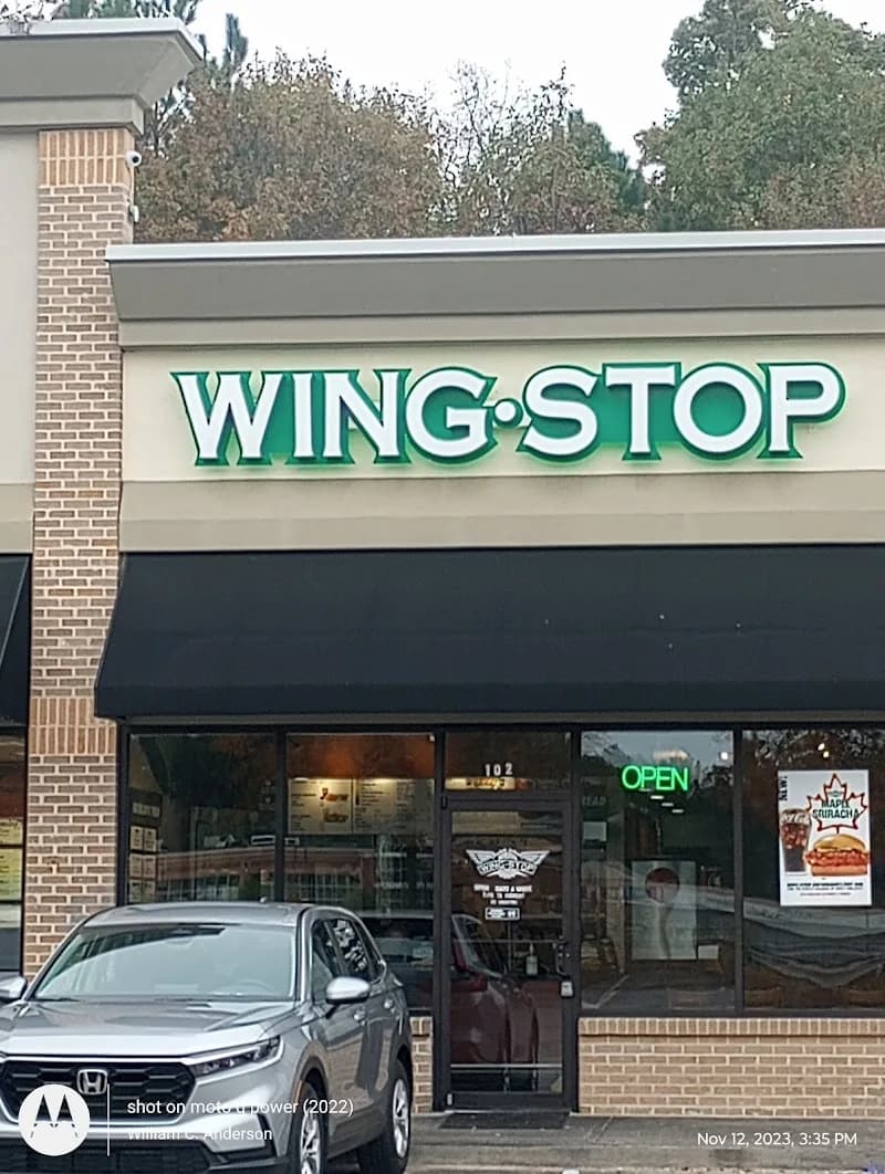 Wingstop storefront outside and inside view at 4920 Flat Shoals Parkway Ste 102 in Decatur, Georgia