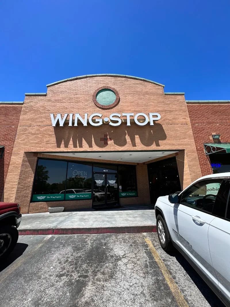 Wingstop storefront outside and inside view at 770 Glynn St N. in Fayetteville, Georgia