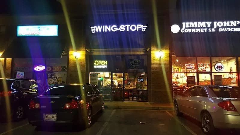 Wingstop storefront outside and inside view at 1133 Chastain Rd Nw Ste 300 in Kennesaw, Georgia