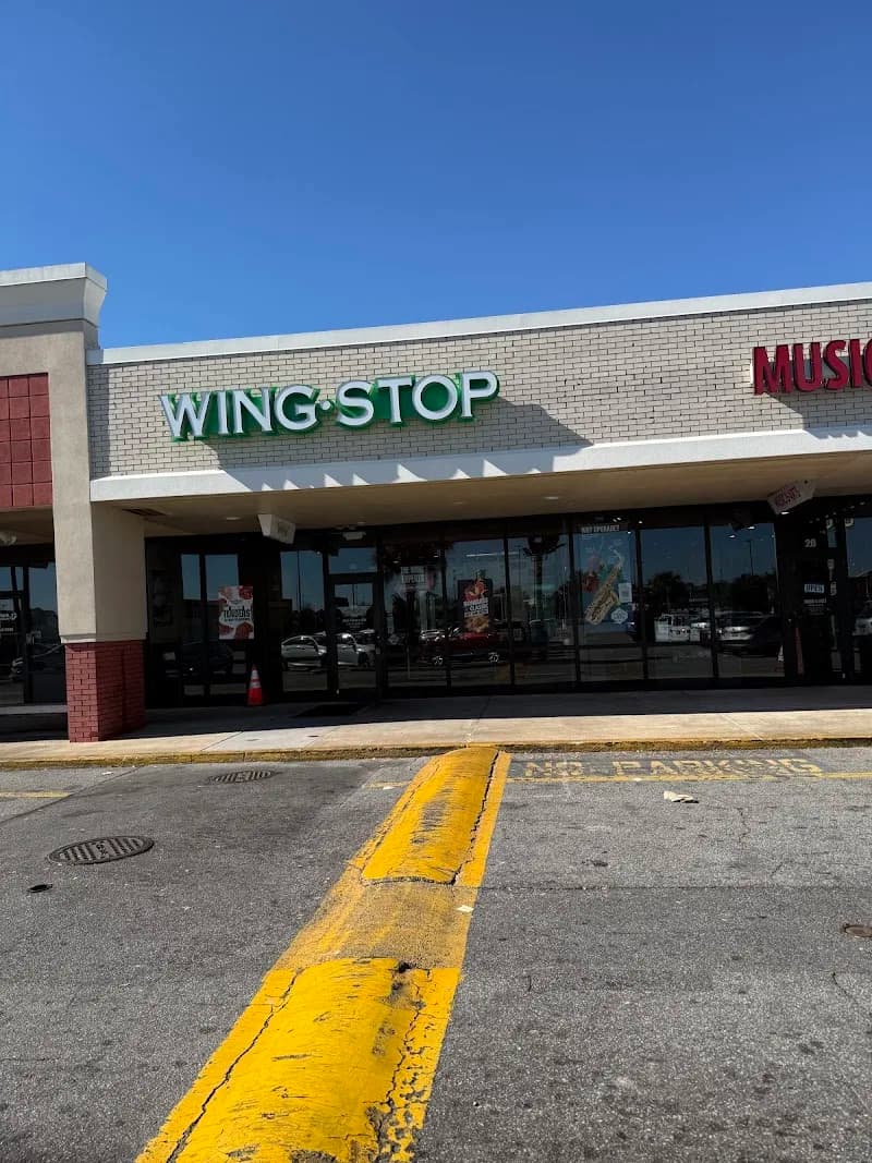 Wingstop storefront outside and inside view at 7805 Abercorn St. in Savannah, Georgia