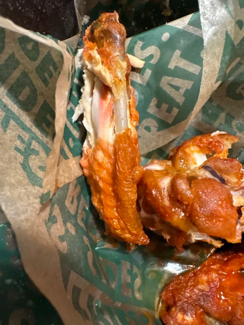 Wingstop storefront outside and inside view at 5710 Ogeechee Rd in Savannah, Georgia