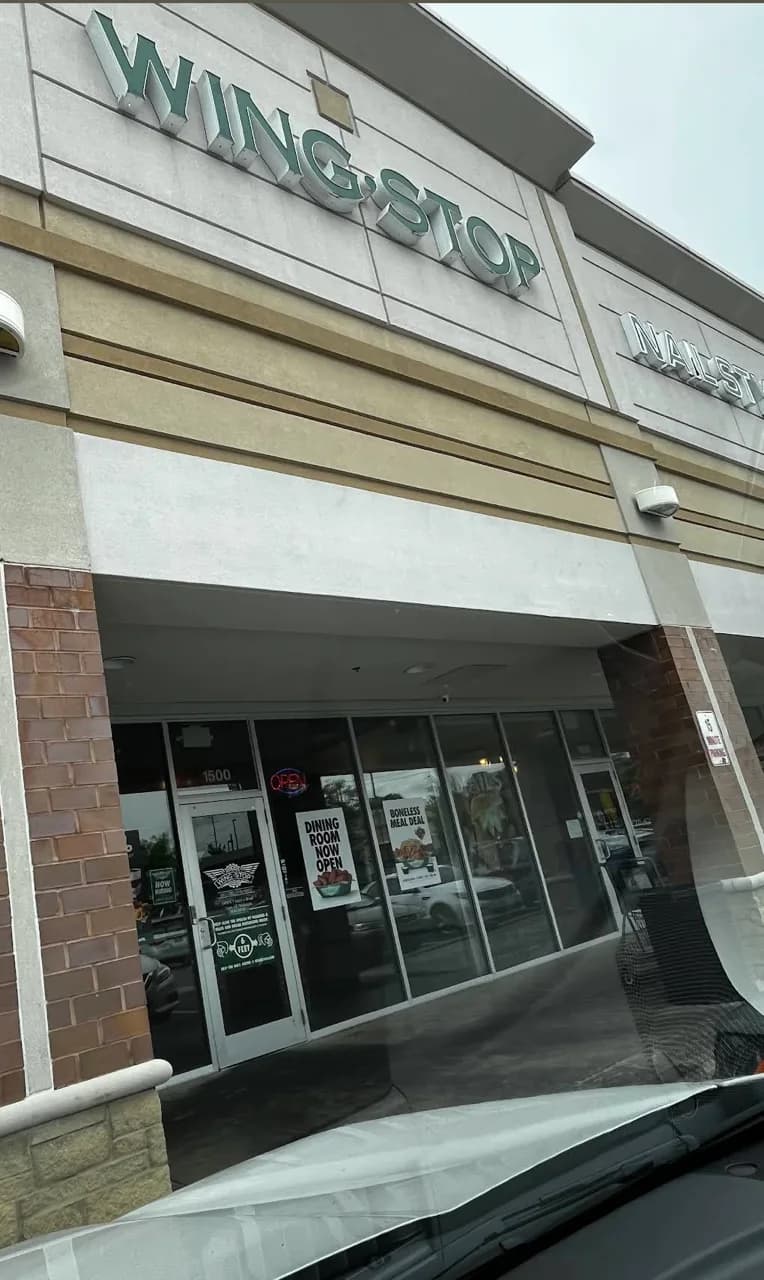 Wingstop storefront outside and inside view at 3240 S. Cobb Dr. in Smyrna, Georgia