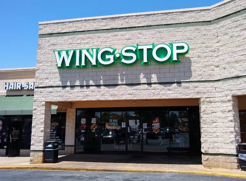 Wingstop storefront outside and inside view at 1525 E. Park Place Blvd Ste 700 in Stone Mountain, Georgia