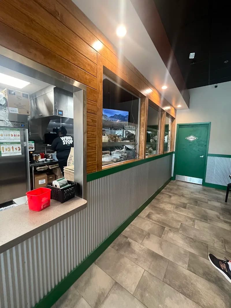 Wingstop storefront outside and inside view at 103 Mirror Lake Connector in Villa Rica, Georgia