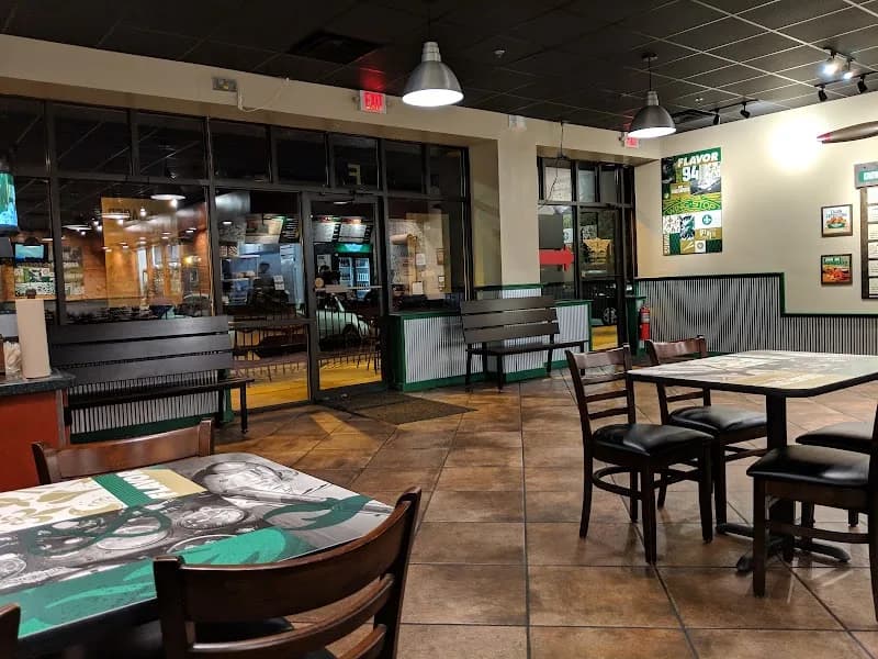 Wingstop storefront outside and inside view at 9745 Highway 92 Ste F in Woodstock, Georgia