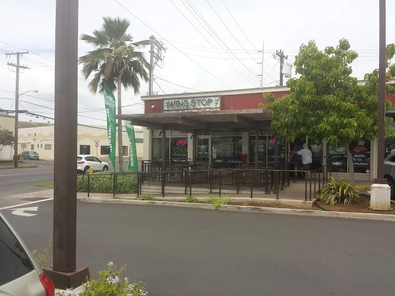 Wingstop storefront outside and inside view at 1210 Dillingham Blvd in Honolulu, Hawaii