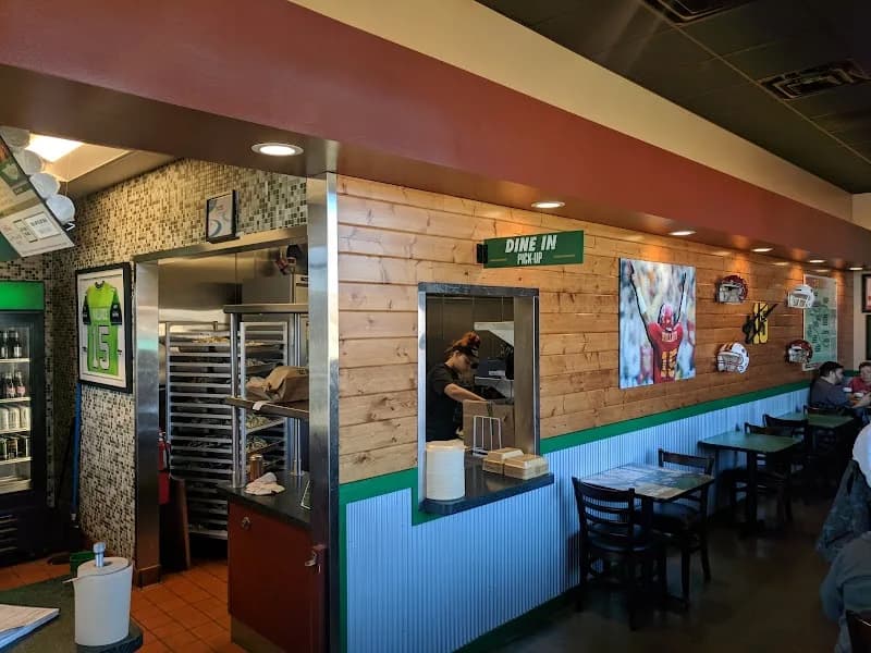 Wingstop storefront outside and inside view at 703 S. Duff Ave Ste 101 in Ames, Iowa