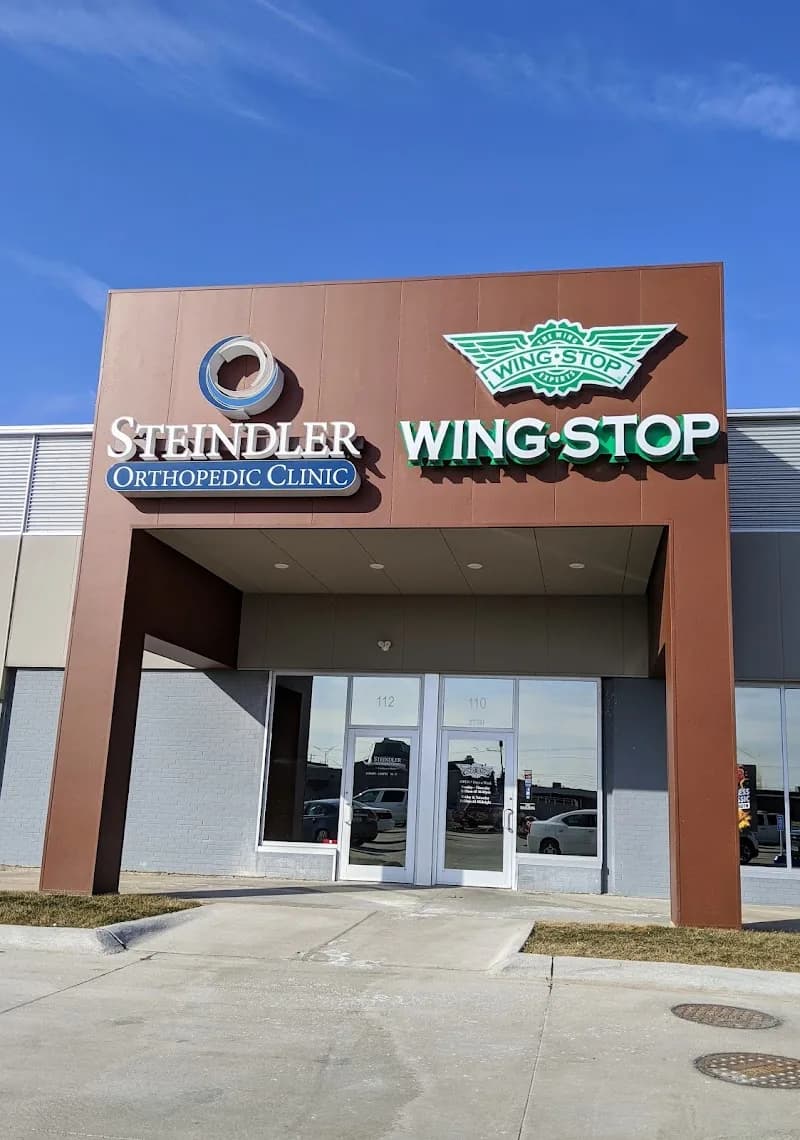 Wingstop storefront outside and inside view at 1115 N Roosevelt Ave in Burlington, Iowa
