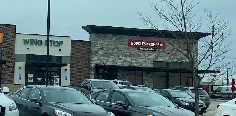 Wingstop storefront outside and inside view at 2360 Edgewood Rd SW Ste 500 in Cedar Rapids, Iowa