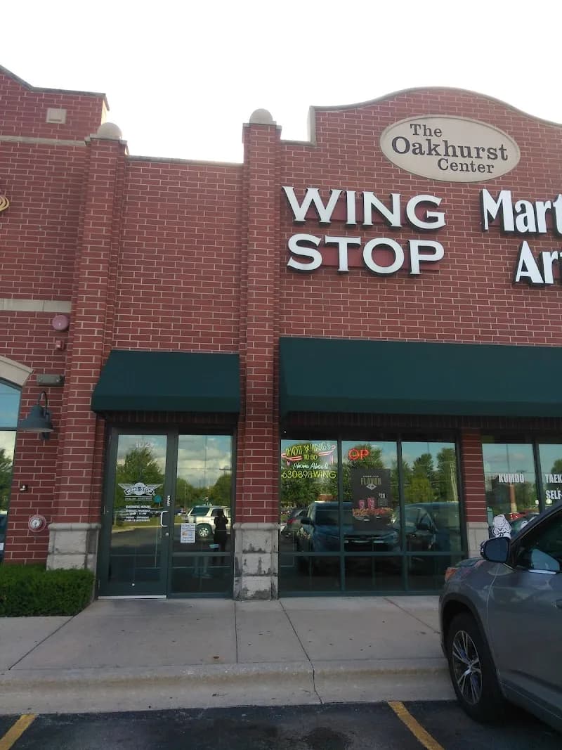 Wingstop storefront outside and inside view at 444 N Eola Rd Ste 102 in Aurora, Illinois
