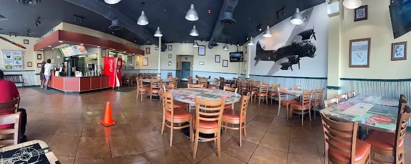 Wingstop storefront outside and inside view at 1261 N Lake St in Aurora, Illinois