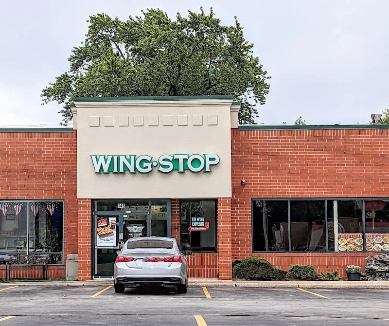 Wingstop storefront outside and inside view at 146 W. Irving Park Rd in Bensenville, Illinois