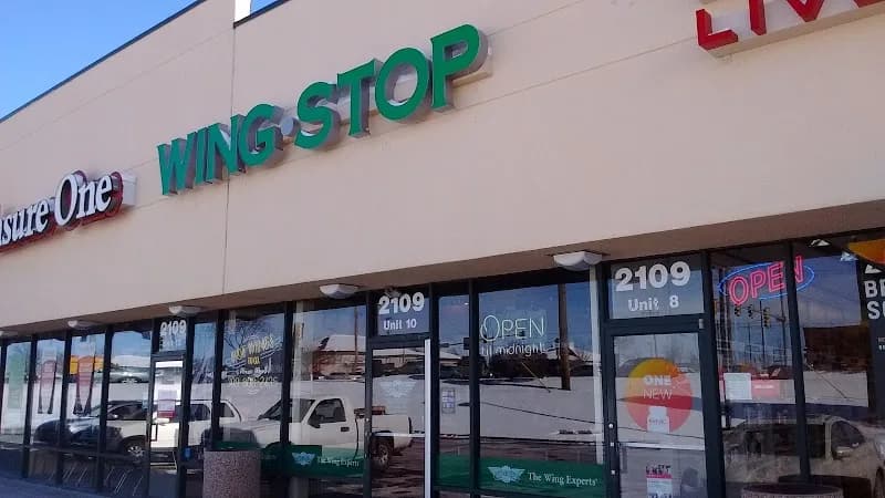 Wingstop storefront outside and inside view at 2109 N Veterans Pkwy #10 in Bloomington, Illinois