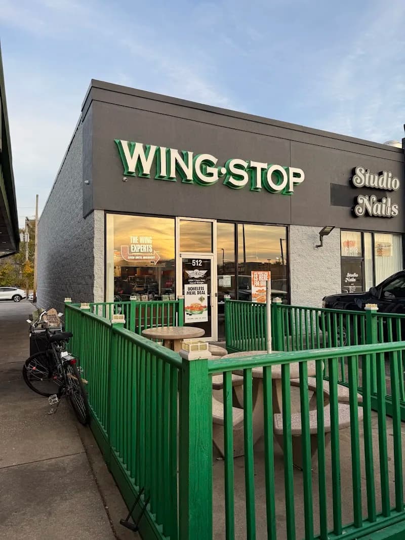 Wingstop storefront outside and inside view at 512 S Neil St in Champaign, Illinois