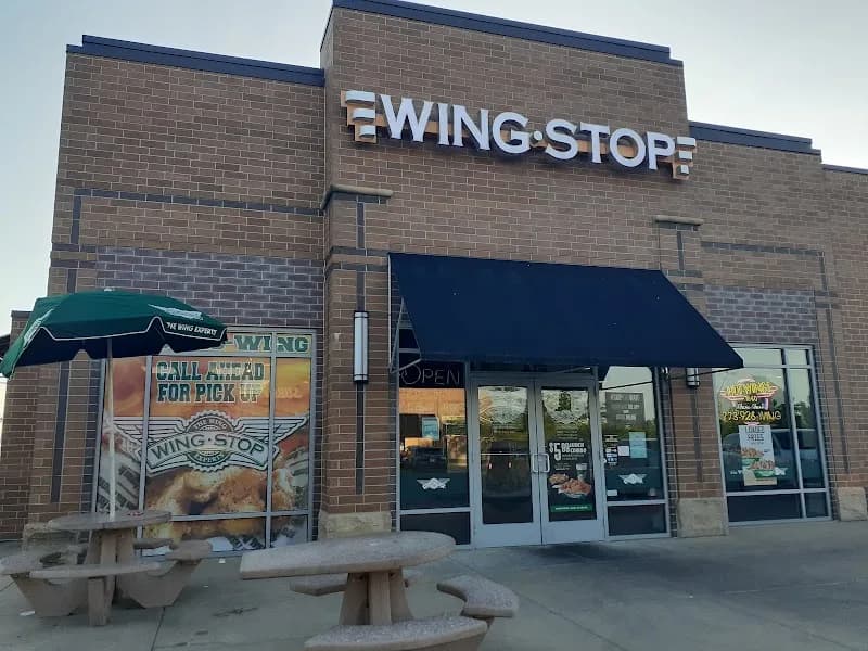Wingstop storefront outside and inside view at 1712 W 119Th St in Chicago, Illinois