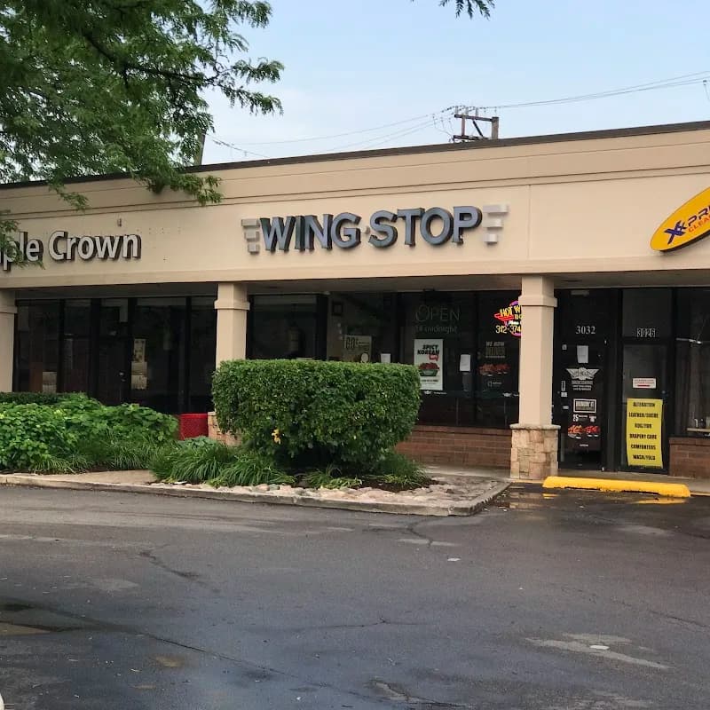 Wingstop storefront outside and inside view at 3032 S Halsted St. in Chicago, Illinois
