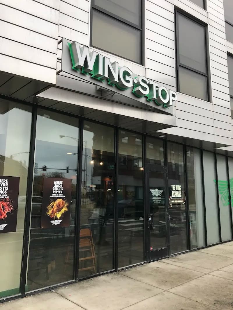 Wingstop storefront outside and inside view at 830 N. Milwaukee Ave in Chicago, Illinois