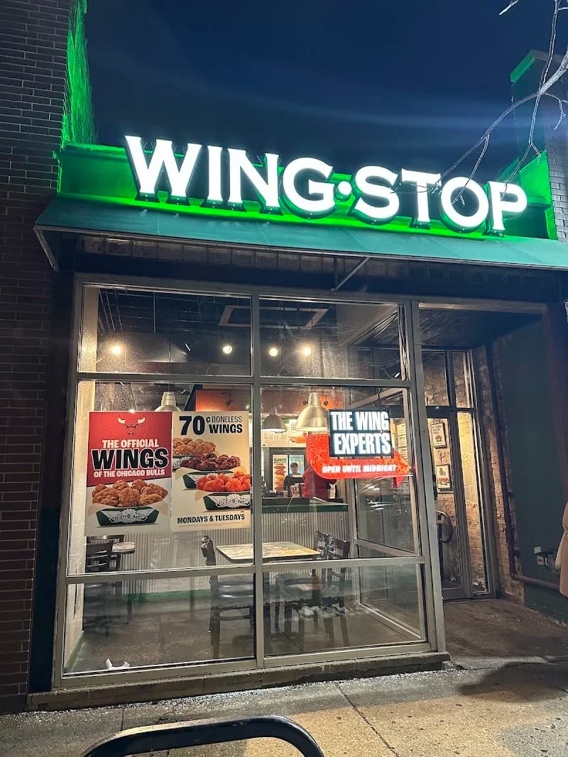 Wingstop storefront outside and inside view at 1637 North Milwaukee Ave in Chicago, Illinois