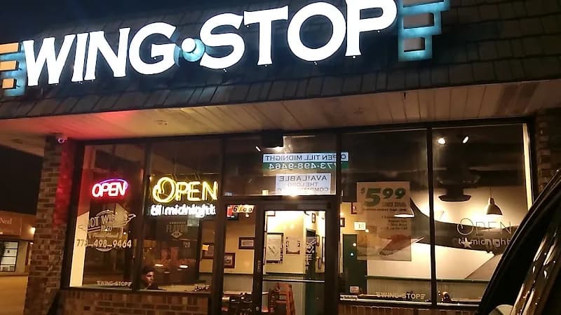 Wingstop storefront outside and inside view at 6188 S Archer Ave in Chicago, Illinois