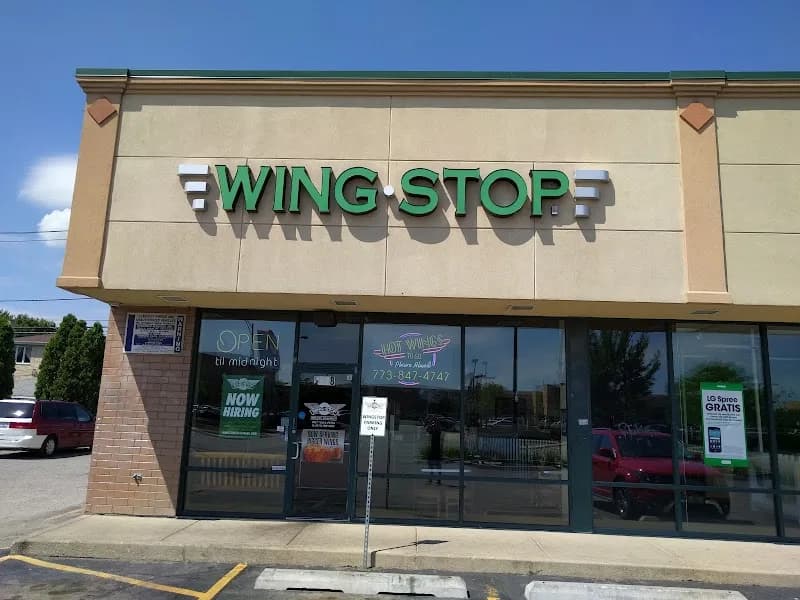 Wingstop storefront outside and inside view at 4428 S Pulaski Rd in Chicago, Illinois