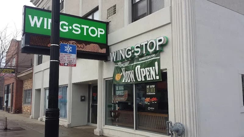 Wingstop storefront outside and inside view at 3046 N. Central Ave in Chicago, Illinois