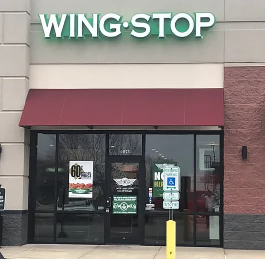 Wingstop storefront outside and inside view at 1075 Collinsville Crossing Blvd in Collinsville, Illinois