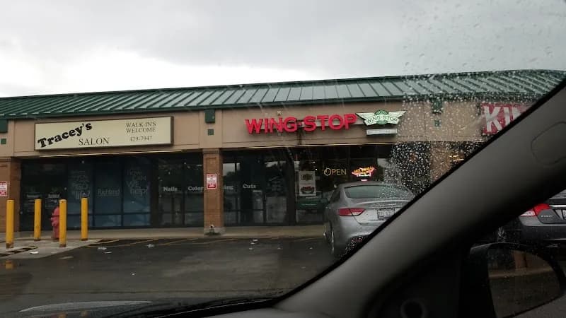 Wingstop storefront outside and inside view at 1491 W King St in Decatur, Illinois