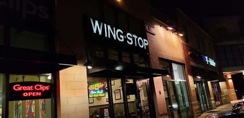 Wingstop storefront outside and inside view at 2434 Main St Ste F in Evanston, Illinois