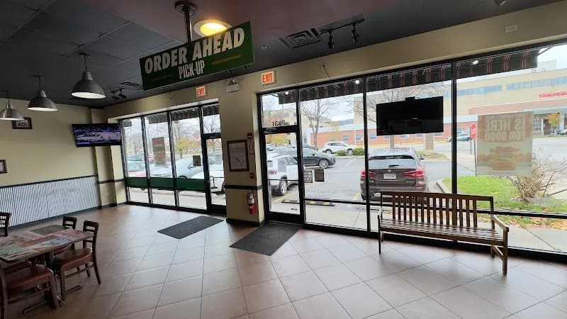 Wingstop storefront outside and inside view at 2831 W. 95th St in Evergreen Park, Illinois