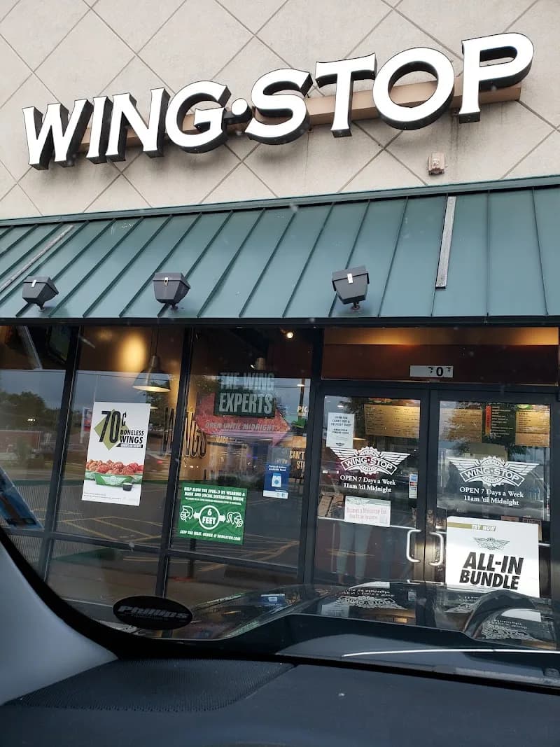 Wingstop storefront outside and inside view at 17707 Torrence Ave in Lansing, Illinois