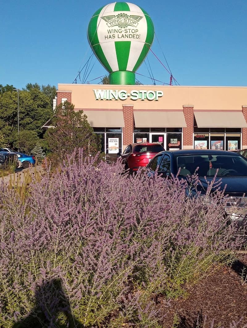 Wingstop storefront outside and inside view at 5357 N. 2nd Street in Loves Park, Illinois