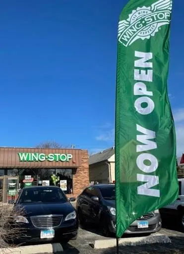 Wingstop storefront outside and inside view at 2710 Martin Luther King Jr. Drive in North Chicago, Illinois