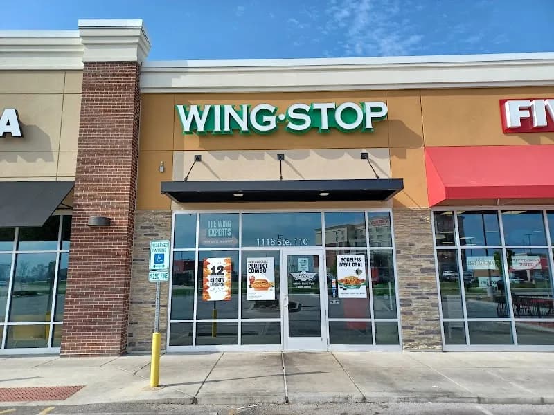 Wingstop storefront outside and inside view at 1118 Merchants Way Suite 110 in Ofallon, Illinois