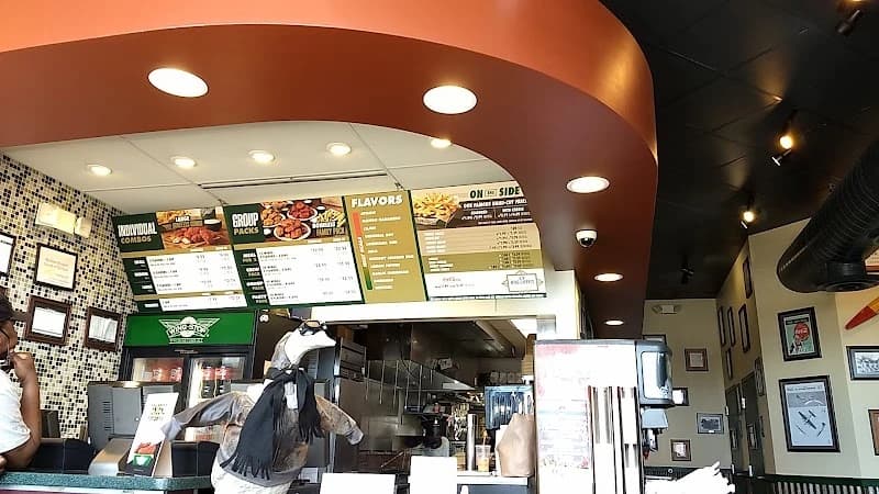 Wingstop storefront outside and inside view at 1212 W Glen in Peoria, Illinois