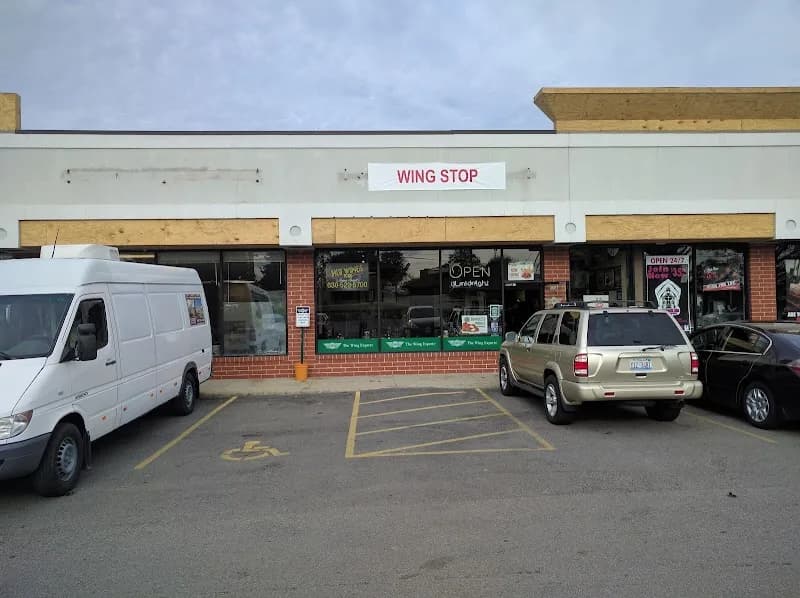 Wingstop storefront outside and inside view at 1306 W Lake St Ste 414 in Roselle, Illinois