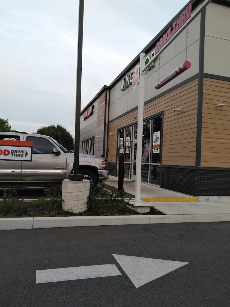 Wingstop storefront outside and inside view at 2255 W Jonathan Moore Pike in Columbus, Indiana