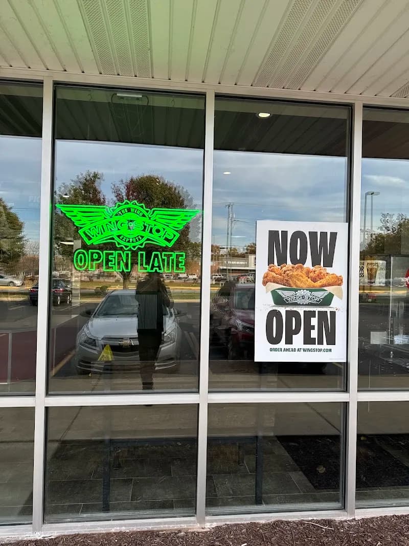 Wingstop storefront outside and inside view at 187 County Rd W in Elkhart, Indiana