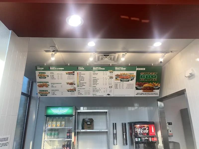 Wingstop storefront outside and inside view at 31 Sibley Street in Hammond, Indiana