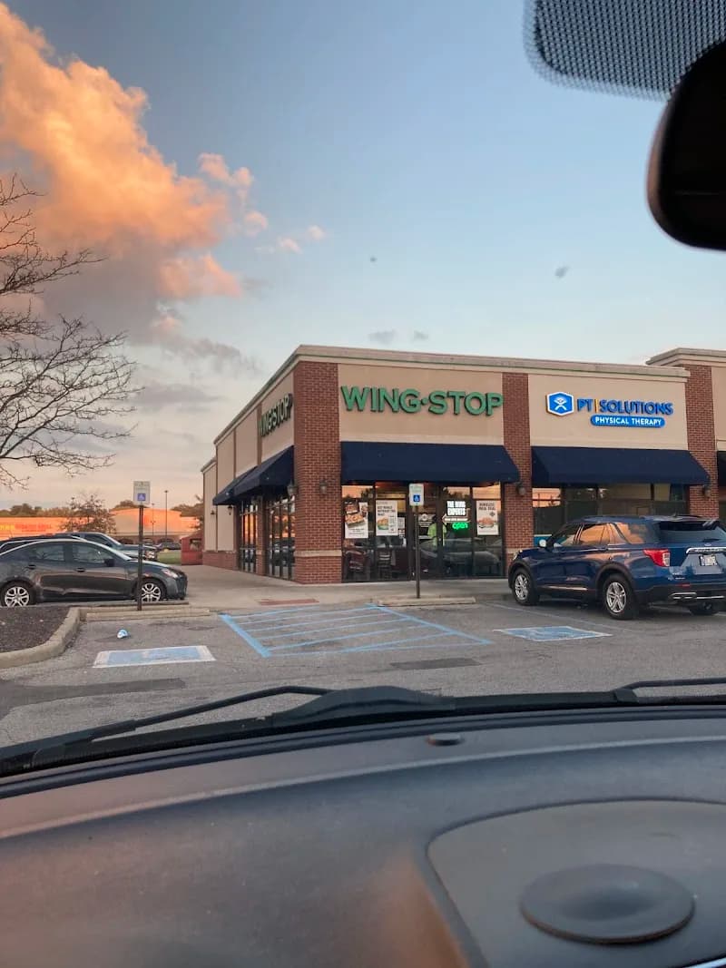 Wingstop storefront outside and inside view at 7711 Shelby St Ste A in Indianapolis, Indiana